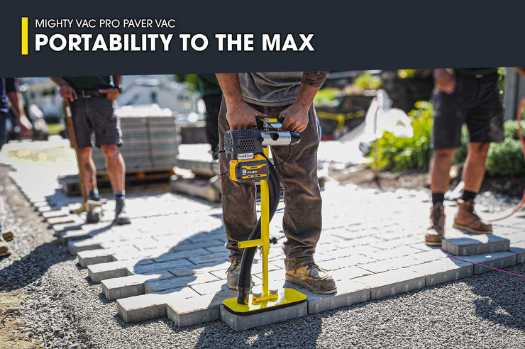 Person using a paver vac on a construction site with text about portability.